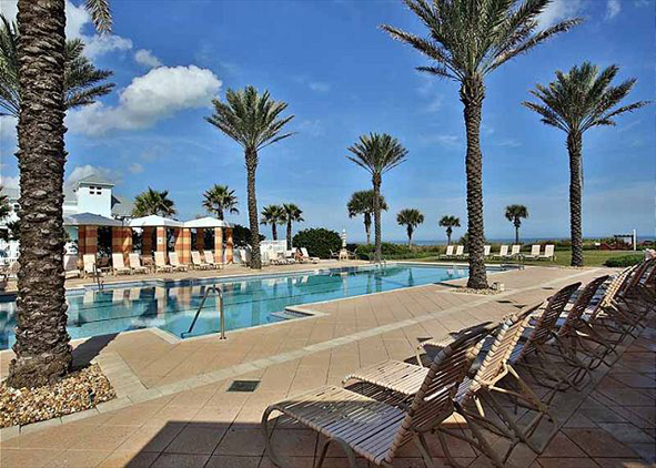 cinn-beach-ocean-pool-palm-trees